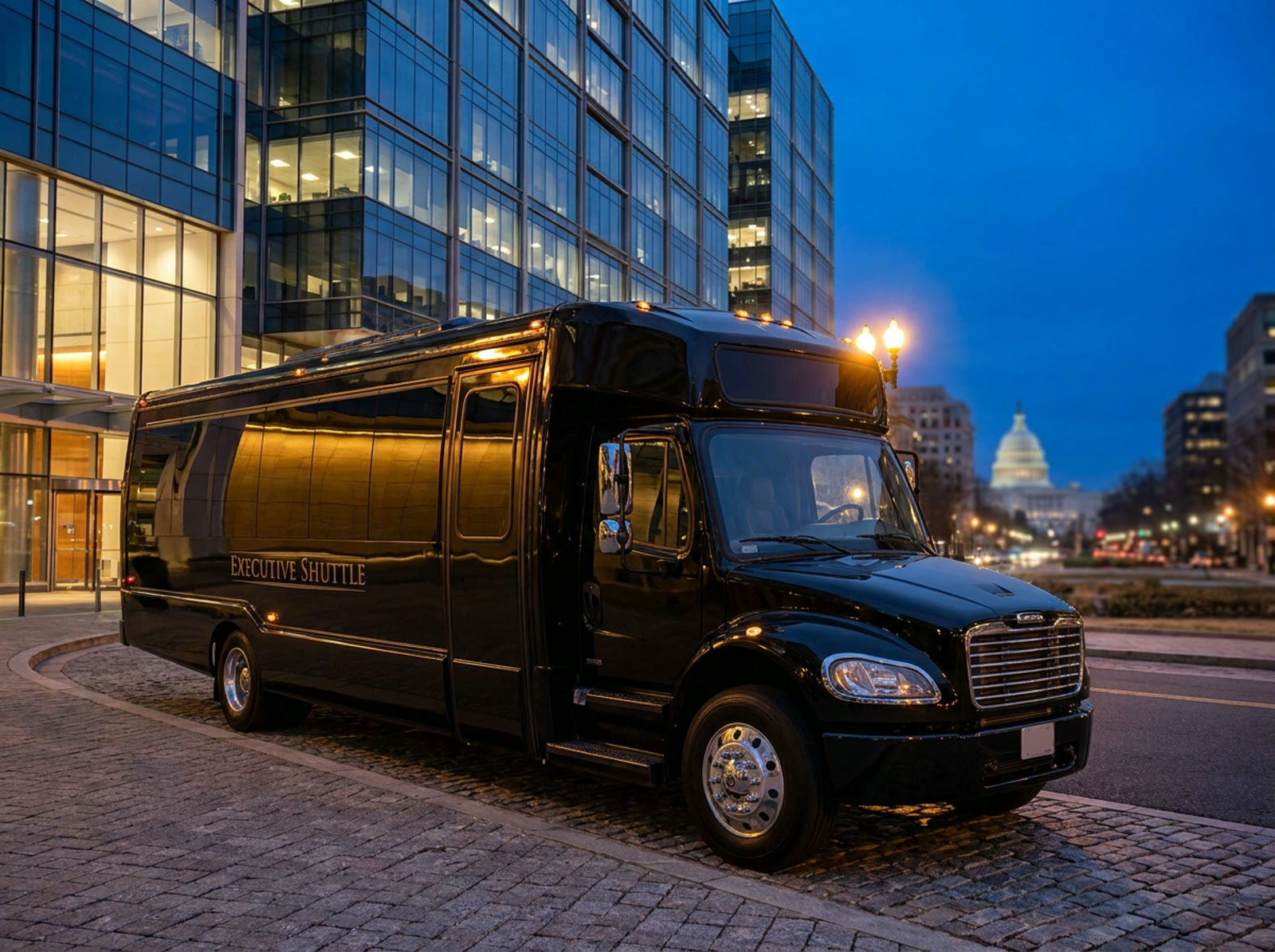 The executive shuttle bus at night with the U.S. Capitol dome behind it